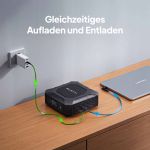 BLUETTI X20 Powerbank lädt einen Laptop an einem mobilen Arbeitsplatz unterwegs